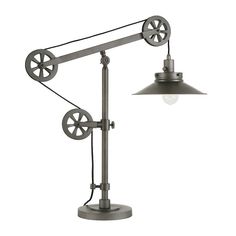 an industrial style desk lamp with wheels on the arm and a light bulb attached to it