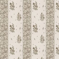 a white and brown striped wallpaper with flowers