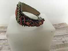 Bead embroidered bracelet boho beaded cuffone of a kind | Etsy Bead Embroidered Bracelet, Macrame Jewelry Tutorial, Cabochon Bracelet, Embroidered Bracelet, Boho Cuff, Bead Embroidery Jewelry, Beaded Cuff, Bracelet Boho, Embroidery Jewelry