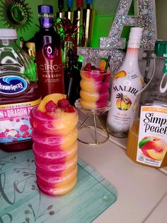 some drinks are sitting on a counter top