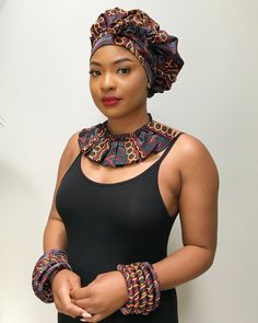 These are African print Ankara jewelry sets are made with Toghu satin print from Cameroon. This necklace doesn’t need much, put it over a simple slip dress and you are the talk of the whole party. This is a true conversation starter.Each set includes a 1 necklace, a pair of earrings and 4 small bangle bracelets ( 2 red and 2 toghu print)- Necklace is tied behind the neckIf you want more bracelets than the 4 that comes with the necklace, they are also sold separately in-store. Ankara Accessories For Ladies, Afro Accessories, African Print Accessories, Ankara Jewelry, Ankara Necklace, African Fabric Accessories, Simple Slip Dress, Ankara Accessories, Black Nativity