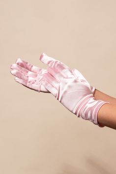 Elevate your style with these beautiful women's wrist-length satin gloves. Made with high-quality, soft satin material, they are comfortable to wear and add a touch of glamour to any outfit. These gloves are perfect for weddings, proms, or any formal occasion. With their elegant and classic design, they are a versatile accessory that will complement any outfit. Available in various colors, these gloves are a must-have for any fashion-forward woman. Shop now and add a touch of sophistication to y Taking Gloves Off Pose, Satin Gloves, Short Gloves, Pink Gloves, Pearl Shop, Holiday Essentials, Satin Material, Navy Pink, Formal Occasion