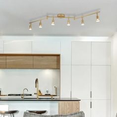 the kitchen is clean and ready to be used as a living room or dining area