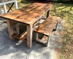 a picnic table and bench made out of wood