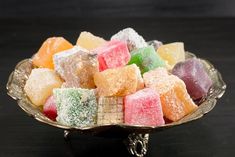 a bowl filled with lots of different colored candies