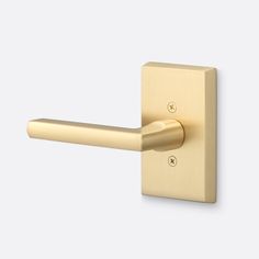 an image of a gold door handle on a white background