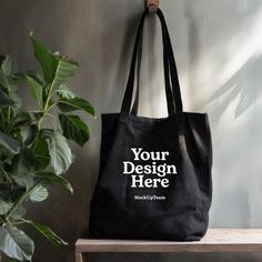 Instantly enhance your online store with our high-quality digital download of this blank tote bag mockup image! Perfect for showcasing your unique designs and artwork. By using our mockups, you can easily place your artwork on the bag and create a stunning visual representation of your products. ⚡ INSTANT DOWNLOAD: Your JPG file at size 2000px x 2000px is instantly downloaded after your payment has cleared with Etsy. No physical product will be sent to you. No refund on digital products. More information about Etsy downloads can be found here: https://www.etsy.com/help/article/3949 If you have trouble using this file, please contact me - I'm happy to help! ⚡ TERMS OF USE: You are allowed to use this product for personal and commercial use. You cannot resell this digital file. By utilising Customizable Eco-friendly Black Bags, Customizable Black Canvas Bag For Daily Use, Customizable Black Canvas Bag For Everyday Use, Black Tote Bag For Personal Use, Customizable Black Rectangular Canvas Bag, Customizable Black Tote Bag, Customizable Black Everyday Bags, Customizable Black Tote Shoulder Bag, Customizable Black Rectangular Bag