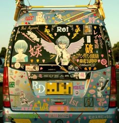 the back end of a van with stickers on it