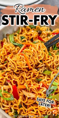 a bowl filled with noodles and vegetables on top of a table