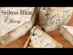 several pieces of cheese on a cutting board with the words sitton bleu cheese