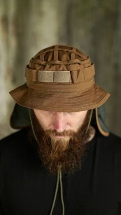 Chin strap bucket hat with neck cover, tactical  cooling boonie hat, fishing boonie hat for man This durable outdoor bucket hat is the perfect sun protection hat for men. The hat is perfectly suited for both urban environments and nature escapades. Ideally suited for military personnel and law enforcement, it's also the choice for adventure seekers including airsoft players, hikers, fishermen, and hunters. Features   * Neck Protection: Boonie hat features a snap buttons neck guard for enhanced s Bonnie Hat, Outdoor Hut, Adventure Hat, Boonie Hat, Art Items, Bucket Hat Design, Neck Cover, Sun Protection Hat, Military Personnel