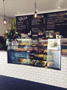 an american tea and coffee shop with the sign above it that says,'american tea & coffee '