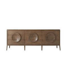 the sideboard is made out of wood and has three circles on it