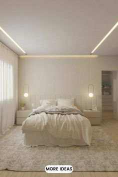 a bedroom with white walls and flooring has a large bed in the center, along with two lamps on either side of the headboard