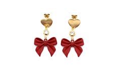 These red bow earrings are the perfect accessory to bring a major dose of sweetness to any outfit! They would be perfect for a festival holiday outfit for Christmas or Valentine's Day, or any day! They feature red bow charms topped with clear rhinestone charms to add just a tiny bit of sparkle. Each earring is finished off with a heart-shaped stainless steel ear post. MATERIALS Stainless Steel Rhinestone Charms Metal Bow Charms Stainless Steel Ear Posts LENGTH 1 3/4" CARE Direct contact with per Cute Earrings With Pink Bow For Gift, Cute Pink Bow Earrings For Gift, Cute Pink Bow Earrings As Gift, Elegant Pink Bow Earrings For Party, Cute Bow Jewelry For Parties, Cute Red Earrings For Christmas, Cute Pink Bow Earrings For Party, Cute Red Christmas Earrings, Elegant Red Jewelry With Bow