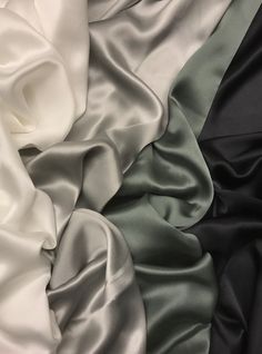 PREMIUM SILK high quality silk satin | gorgeous fabric for festive blouses and dresses This luxurious and lightweight silk satin is available in four charming colours: white, gray, moss green and black. This fabric has a smooth, luxurious hand and a soft fluid drape. The gorgeous silk is perfect for all kinds of festive dresses, tops and blouses. You can also use it for evening gowns and even wedding dresses! This fabric is designed and made in Europe. + + + + + Get inspired and enjoy sewing wit Silk Mood Board, Luxury Solid Satin Ties, Luxury Elegant Raw Silk Fabric, Silk Satin Fabric Floral, Party Silk Scarf With Satin Finish, Elegant Green Satin Silk Scarf, Silk Material Fabrics, Fabrics Photography, Satin Aesthetic