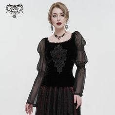 A Gothic Velvet Top.It features mesh lantern sleeves and a square neckline.The centre front is decorated with appliqued lace motif.The cuffs and the neckline are bordered with minimalistic gothic lace. Product specifications:Style: GothicMaterial: POLYESTER 95%, SPANDEX 5% Velvet Applique, Floral Embroidered Shirt, Rock Style Outfits, Rock Style Clothing, Fitted Blouse, Black Pants Men, Rock Outfit, Gothic Vintage, Velvet Accents