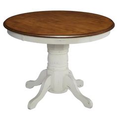 a white and wood table with four legs