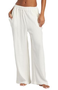 Perfect for casual days spent strolling the boardwalk, this pair of wide-leg pants is made from airy, gauzy cotton for a flowy fit. 27" inseam; 28" leg opening; 12" front rise; 14" back rise (size medium) Elastic waist Side-seam pockets 100% cotton Machine wash, tumble dry Imported Cute Flowy Pants, White Loose Pants, Lenin Pants, Flowy Pants Outfit, Beachy Pants, Cotton Gauze Pants, Knit Wide Leg Pants, Slouch Jeans, White Pants Outfit