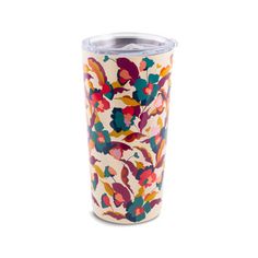 the tumbler cup is decorated with colorful flowers