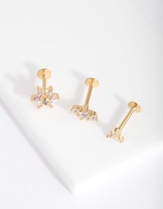 Description
This gold-toned flat back earring pack features a variety of embellished gem cluster designs. They have surgical steel posts. 
Size: 16G/1.2mm
Length: 8mm Love Piercings, Gem Cluster, Earring Pack, Flower Flat, Fashion Jewellery Online, Steel Flowers, Flat Back Earrings, Surgical Steel Earrings, Bold Earrings