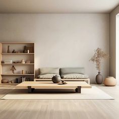 a living room filled with furniture and a book shelf next to a large open window