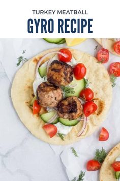 turkey meatball gyro recipe with tomatoes, cucumbers and onions on a tortilla