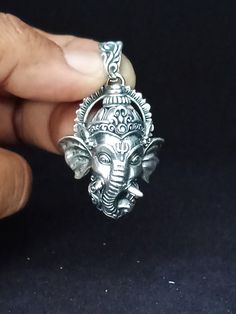 Ganesh pendant, Hindu jewelry, religious gifts. ITEM DESCRIPTION  Dimension product  Height :50 mm width : 30 mm  ITEM DESCRIPTION  Ganesh pendant 925 Sterling Solid This beautiful Ganesh pendant has been amazingly cast with 925 Sterling Silver All products will have stamp 925 on the back or on the inside of product. The weight of the pendant is24-26Grams We are a small business located in Bali, we have export experience for more than 10 years, so we can bring you the best quality goods at the m Symbolic Silver Jewelry For Puja, Spiritual Engraved Jewelry For Diwali, Diwali Gift Pendant Jewelry, Diwali Gift Locket Jewelry, Silver Symbolic Jewelry For Diwali, Engraved Jewelry For Diwali Gifts, Sterling Silver Temple Jewelry For Meditation, Silver Locket Jewelry For Diwali, Silver Spiritual Locket Jewelry