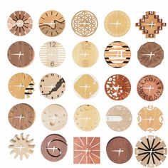 wooden clocks with different designs and numbers on each one side, all made out of wood