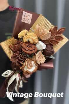 a woman holding a bouquet of flowers with the words vintage bouquet written in chinese on it