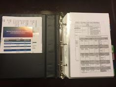 an open binder with some papers on it