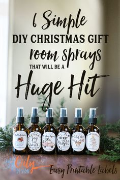 six bottles of holiday essentials sitting on a table with the words, i simple diy christmas gift room sprays that will be a huge hit