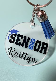 a keychain with a name tag on it that says, sein or kaltyn