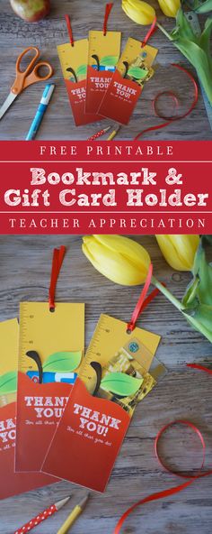 the printable bookmark and gift card holder is on top of a table with scissors