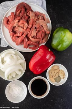 the ingredients to make this dish include peppers, onions, and ground meat on a white plate