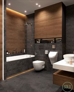 a bathroom with two sinks, a toilet and a bathtub