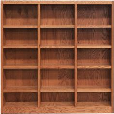 an empty wooden bookcase with many shelves