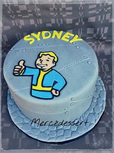 there is a cake with a man on it that says sydney mercedsert