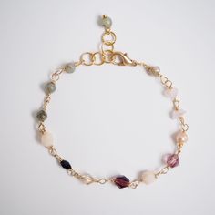 Handmade Gold Chain Bracelet Featuring The Enchanting Allure Of Labradorite, Swarovski Crystals, Freshwater Pearls, And The Soothing Elegance Of Rose Quartz. Each Piece Is Meticulously Crafted, Adding A Touch Of Sophistication To Your Accessory Collection. Embrace The Unique Blend Of Delicate Design And Natural Gemstone Beauty A Perfect Statement For Any Occasion. Labradorite Rose Quartz Freshwater Pearls Swarovski Crystals Beads Length 7.5 Inches Dainty Crystal Bracelet, Paperclip Chain Bracelet, Chain And Bead Bracelet, Wire Bracelet Ideas, Dainty Beaded Bracelets, Brown Beaded Bracelets, Chain Bracelet Ideas, Wire Bead Bracelet, Gemstone Chips Jewelry