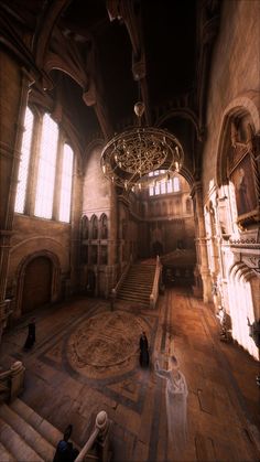 the interior of an old building with stairs and chandelier