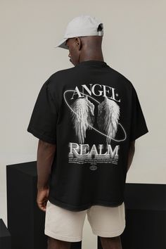 Introducing our Angel Wings Oversized T-Shirt, the unisex street style clothing for both men and women. This unique tee boasts an oversized fit, delivering a relaxed and effortlessly cool aesthetic. The striking angel wings design adds a touch of urban, making it a versatile statement piece for any wardrobe. Crafted with attention to detail and comfort, this shirt embodies the perfect fusion of style and ease, ensuring you stand out while staying comfortable in your streetwear fashion endeavors. 🌱 SAVING THE TREES WITH EACH PURCHASE 🌱 With every purchase you make, we pledge to plant a tree. Your support not only benefits the environment but also transforms lives. Join us in planting trees and making a positive impact. We appreciate your contribution! ✨ Quality ✨ Our clothing boasts 100% Angel Streetwear, Angel Wings Shirt Design, Angel Tshirt Design, Gothic Graphic Print T-shirt For Streetwear, Angel Wings Design, Luxury Skull Print T-shirt For Streetwear, Damaged Clothes, Wings Design, Angel Wings