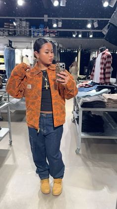 Carhartt jacket, timberlands, southpole pants, slick bun Pink Carhartt Jacket Outfit, Carhartt Fits Women, Camp Jacket Outfit, Timberland Outfits Black Women, Carpenter Pants Women Outfit, Letterman Jacket Outfit Black Women, Cardigan Outfit Streetwear, Timberland Boots Outfit Baddie, Ny Hat Outfit