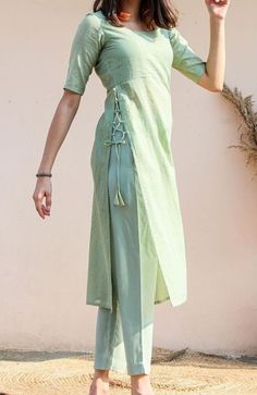 #kurti #green #fashion #Designer Classy Kurtas For Women, Salwar Top Designs, Traditional Chudidar Dress, Kurti Designs Neck Design, Plain Kurta, Indian Kurti Designs Casual, Plain Kurta Design, Kurta From Saree Design, Kurthi Tops Designs