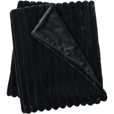 four pieces of black minknix blanket folded on top of eachother