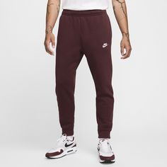 A closet staple, the Nike Sportswear Club Fleece Joggers combine a classic look with the soft comfort of fleece for an elevated, everyday look that you can wear every day. Fall Sportswear Fleece Joggers, Fall Fleece Joggers Sportswear, Nike Sporty Sweatpants For Fall, Comfortable Nike Fleece Joggers, Casual Burgundy Bottoms For Streetwear, Nike Casual Joggers, Nike Sportswear Sweatpants For Fall, Nike Casual Sweatpants For Fall, Nike Cotton Winter Joggers