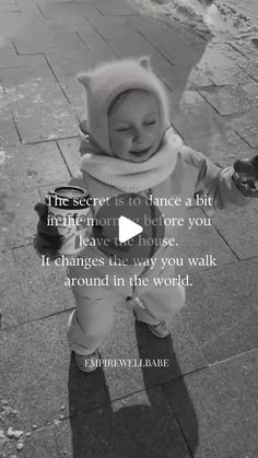 a baby is standing on the sidewalk with a caption that reads, the secret is to dance at bit in the morning before you leave the house