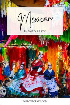 mexican themed party with colorful streamers and people dressed in traditional costumes for the day of the dead