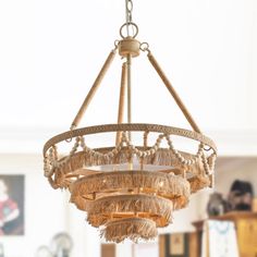 a chandelier hanging from a ceiling in a room