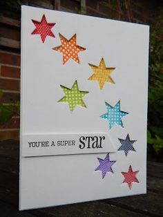 a handmade card with colorful stars and the words you're a super star