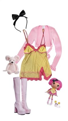 the doll is wearing a yellow dress and boots